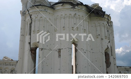 View to destroyed church at Kharkivska oblast. Ruined building after bomb attacks on ukrainian territory from russia army. Consequences of russian invasion of Ukraine. Slow motion View to destroyed church at Kharkivska oblast. Ruined building after bomb attacks on ukrainian territory from russia army. Consequences of russian invasion of Ukraine. Slow motion 142069703