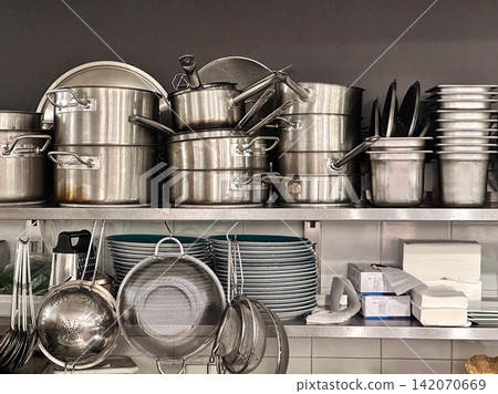 Commercial Kitchen Storage with Stainless Steel Cookware Commercial Kitchen Storage with Stainless Steel Cookware 142070669