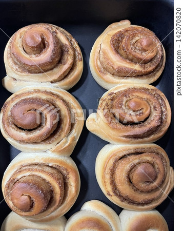 Soft, gooey cinnamon roll with a swirl of cinnamon sugar and a drizzle of creamy icing on top. Perfectly spiced and freshly baked, ideal for a cozy treat any time of day. Soft, gooey cinnamon roll with a swirl of cinnamon sugar and a drizzle of creamy icing on top. Perfectly spiced and freshly baked, ideal for a cozy treat any time of day. 142070820