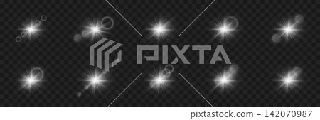 Collection of transparent optical elements creating starbursts, glare, and bright light 142070987