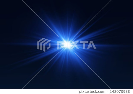 Blue light burst creating a radiant starburst effect on a dark background 142070988