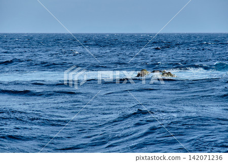a natural rocks emerged in the open ocean name 'Richelieu Rock', one of the famous scuba diving site in Thailand a natural rocks emerged in the open ocean name 'Richelieu Rock', one of the famous scuba diving site in Thailand 142071236