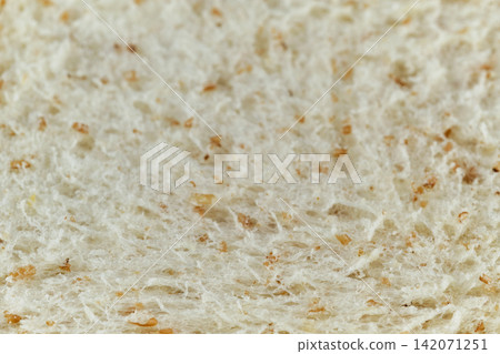 close up shot of a surface texture of sliced whole wheat sandwich bread for food background wallpaper 142071251