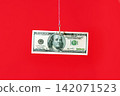 Dollar bill on hook over red background 142071523
