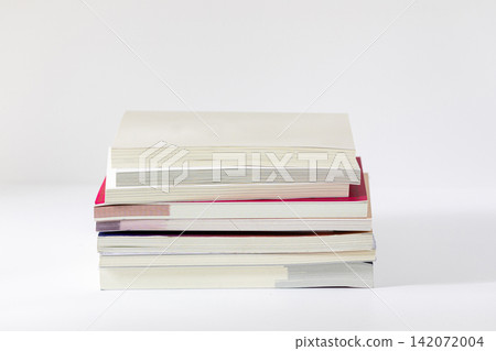 Stack of Textbooks Piled on White Background in Front View Stack of Textbooks Piled on White Background in Front View 142072004