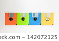 Colorful Floppy Disks in a Row on White Background Retro Technology 142072125