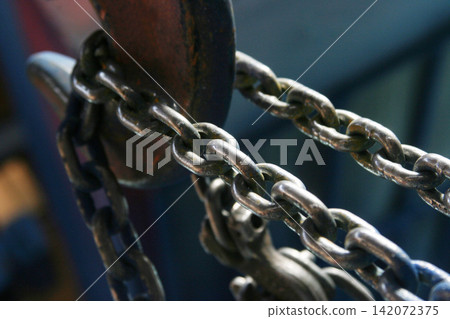 heavy metal chain and crane hook heavy metal chain and crane hook 142072375
