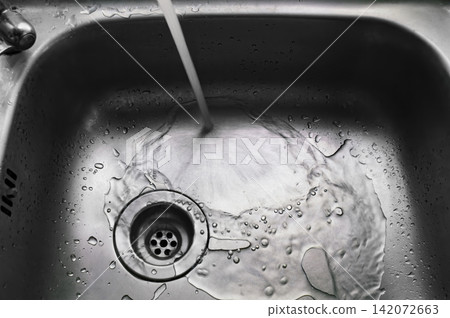 a wet dirty sink after washing many dishes photo may had noise and gain a wet dirty sink after washing many dishes photo may had noise and gain 142072663