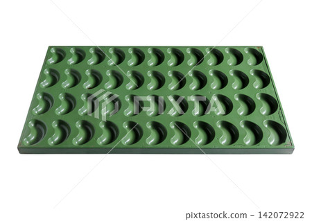 Cake mold on a white background. Professions: Patisserie. Cake mold on a white background. Professions: Patisserie. 142072922