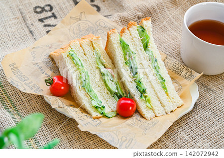 Cucumber and ham sandwich Cucumber and ham sandwich 142072942