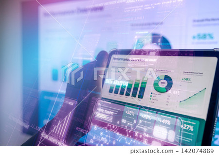 View a futuristic data analysis screen on your tablet. View a futuristic data analysis screen on your tablet. 142074889