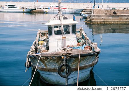 【#boat】A small fishing boat docked in the harbor 【#boat】A small fishing boat docked in the harbor 142075757