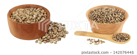 Hemp seeds in wooden bowl isolated on white background with full depth of field Hemp seeds in wooden bowl isolated on white background with full depth of field 142076448