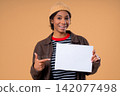 Smiling Pretty Teenage Girl Holding Horizontal Blank White A4 Paper Poster Toward Camera, Young 142077498