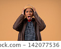 Angry African Teenage girl Yelling At Camera With Expressive Face In Frustration. Lady in stress and 142077536