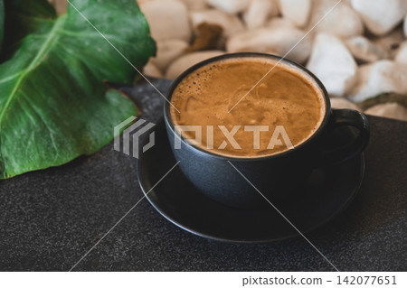 Minimalist Black Coffee Cup Close Up. 142077651