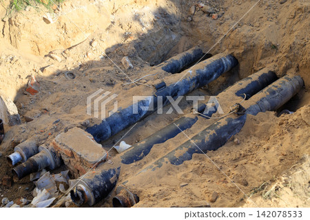 Pipeline Replacement Works with Insulated Pipes Exposed in Groun Pipeline Replacement Works with Insulated Pipes Exposed in Groun 142078533