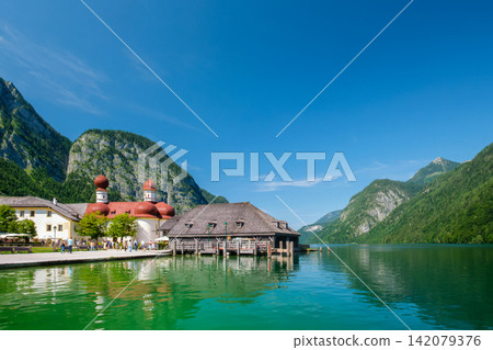 St Bartoloma church on Konigsee lake with mountain alpine landscape in Bavaria St Bartoloma church on Konigsee lake with mountain alpine landscape in Bavaria 142079376