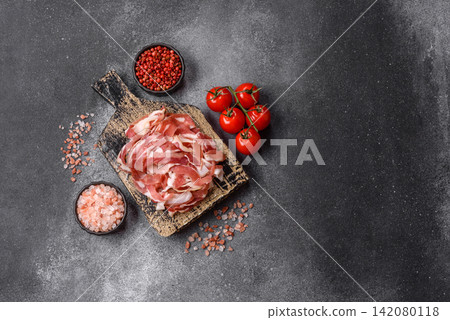 Slices of pork pancetta, ham, or bacon for a festive antipasto platter Slices of pork pancetta, ham, or bacon for a festive antipasto platter 142080118