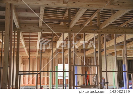 Scenes from the construction of a new wooden house. Scenes from the construction of a new wooden house. 142082129