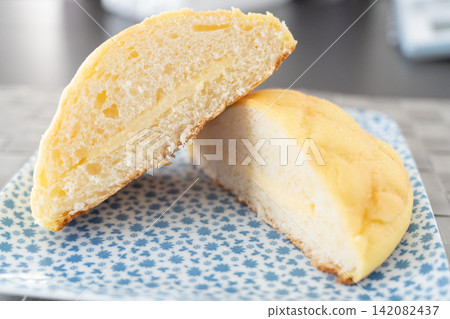 Close-up of the soft cross-section of a melon bun Close-up of the soft cross-section of a melon bun 142082437