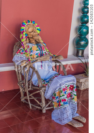 Mexican Day of the Dead skeleton woman figure in colorful traditional style, folk art decoration, cultural heritage and Dia de los Muertos symbol concept Mexican Day of the Dead skeleton woman figure in colorful traditional style, folk art decoration, cultural heritage and Dia de los Muertos symbol concept 142083103