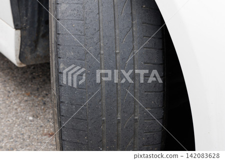 Worn-out tires Worn-out tires 142083628