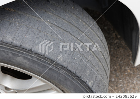 Worn-out tires Worn-out tires 142083629