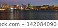 Montreal skyline illuminated at night with Saint Lawrence River on the foreground, Canada 142084090