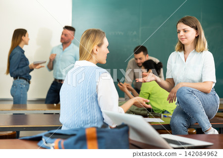 Students chatting during recess in university Students chatting during recess in university 142084962