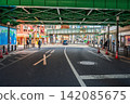 Street road under green steel railway bridge near Takadanobaba in Tokyo Japan 142085675