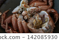 Boiled hairy crab and rich crab miso packed in the shell 142085930