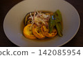 Grilled summer vegetables marinated in a Japanese-style sauce: zucchini, eggplant, and bell peppers. 142085954