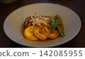 Grilled summer vegetables marinated in a Japanese-style sauce: zucchini, eggplant, and bell peppers. 142085955