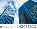 Clouds reflecting off office buildings in the business district Clouds reflecting off office buildings in the business district 142086018