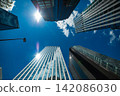Clouds reflecting off office buildings in the business district Clouds reflecting off office buildings in the business district 142086030