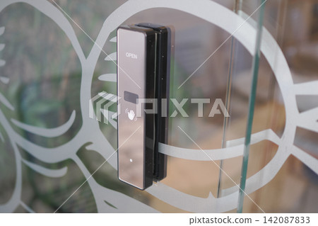 Door sensor for entry at a store Door sensor for entry at a store 142087833