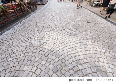 Cobblestone streets in the historic district of Vilnius, Lithuania Cobblestone streets in the historic district of Vilnius, Lithuania 142088564
