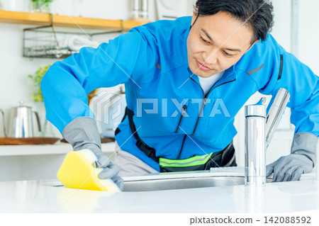 Male housekeeper Male housekeeper 142088592