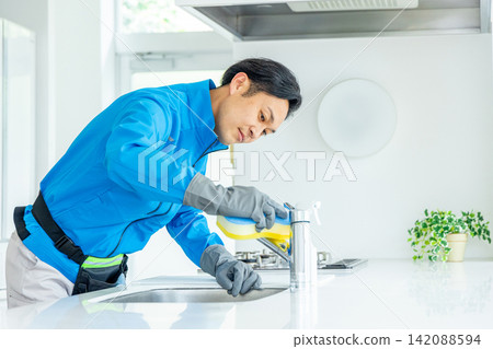 Male housekeeper Male housekeeper 142088594