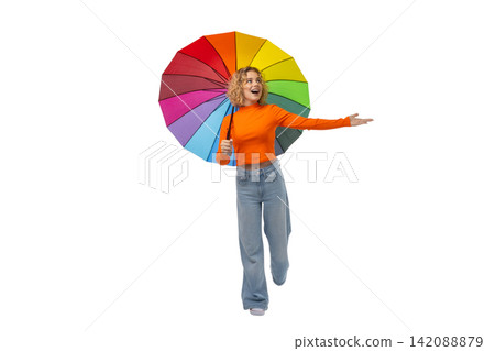 Young person walks joyfully with an umbrella, isolated on white, PNG Young person walks joyfully with an umbrella, isolated on white, PNG 142088879