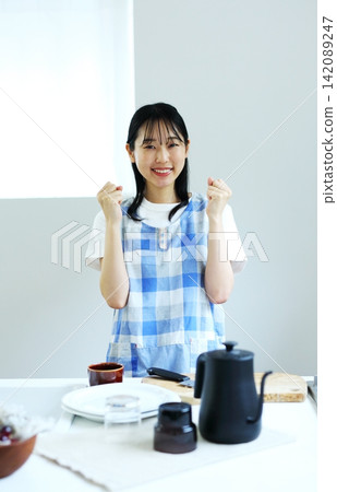 A woman's kitchen: Cooking image 142089247
