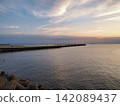 Sunset over the sea 142089437