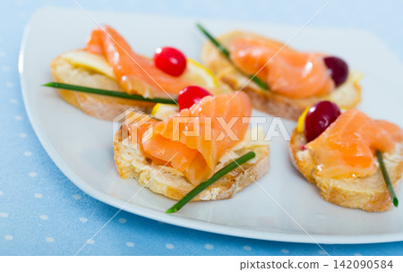Bruschettes with salmon 142090584