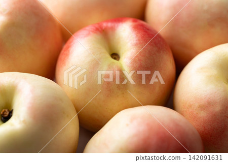 Close-up of fresh organic nectarines texture background Close-up of fresh organic nectarines texture background 142091631