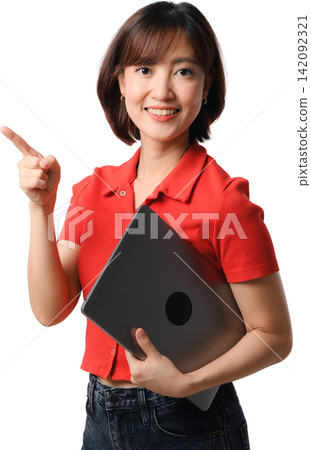 Happy asian woman holding laptop pointing finger showing promotion transparency background with joyful smile and confident positive gesture Happy asian woman holding laptop pointing finger showing promotion transparency background with joyful smile and confident positive gesture 142092321