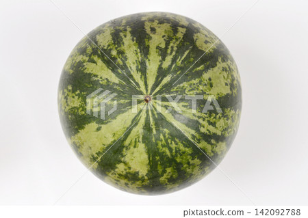 Whole striped watermelon on white background Whole striped watermelon on white background 142092788
