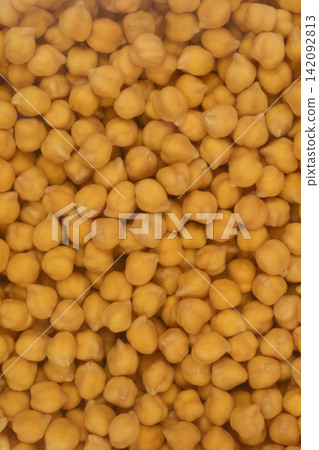 Texture background of raw rehydrated yellow chickpeas in water Texture background of raw rehydrated yellow chickpeas in water 142092813
