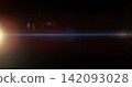 Blue anamorphic lens flare overlay featuring cinematic horizontal light streaks, soft optical reflections and subtle glow on a black background. Premium VFX element for compositing and film editing. Blue anamorphic lens flare overlay featuring cinematic horizontal light streaks, soft optical reflections and subtle glow on a black background. Premium VFX element for compositing and film editing. 142093028