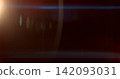 Warm anamorphic lens flare overlay featuring a golden light source, blue horizontal light streak, realistic optical reflections and subtle glow on a black background. Premium VFX asset for Warm anamorphic lens flare overlay featuring a golden light source, blue horizontal light streak, realistic optical reflections and subtle glow on a black background. Premium VFX asset for 142093031